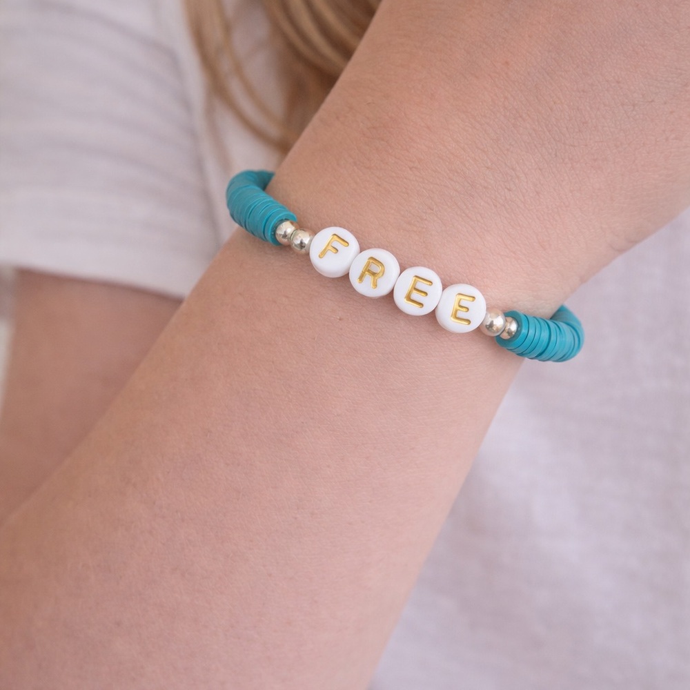 Turquoise Beaded Bracelet with 'FREE' Lettering